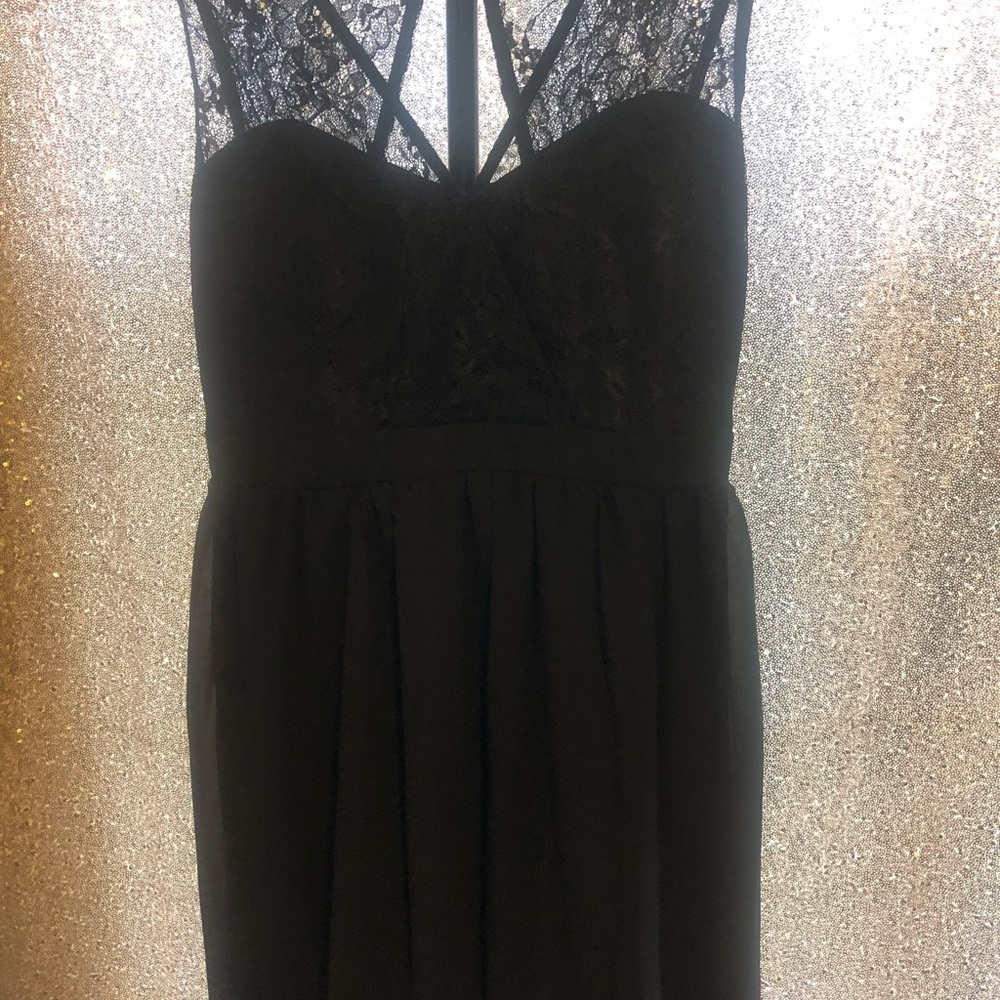Black cocktail dress with lace detail